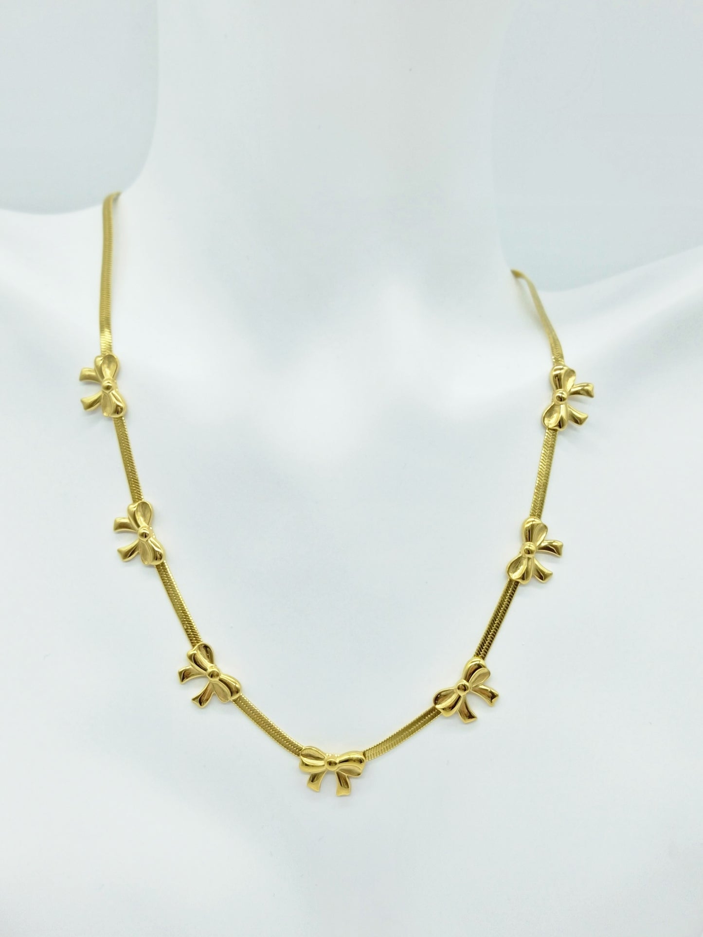 Collar de moños Dorado