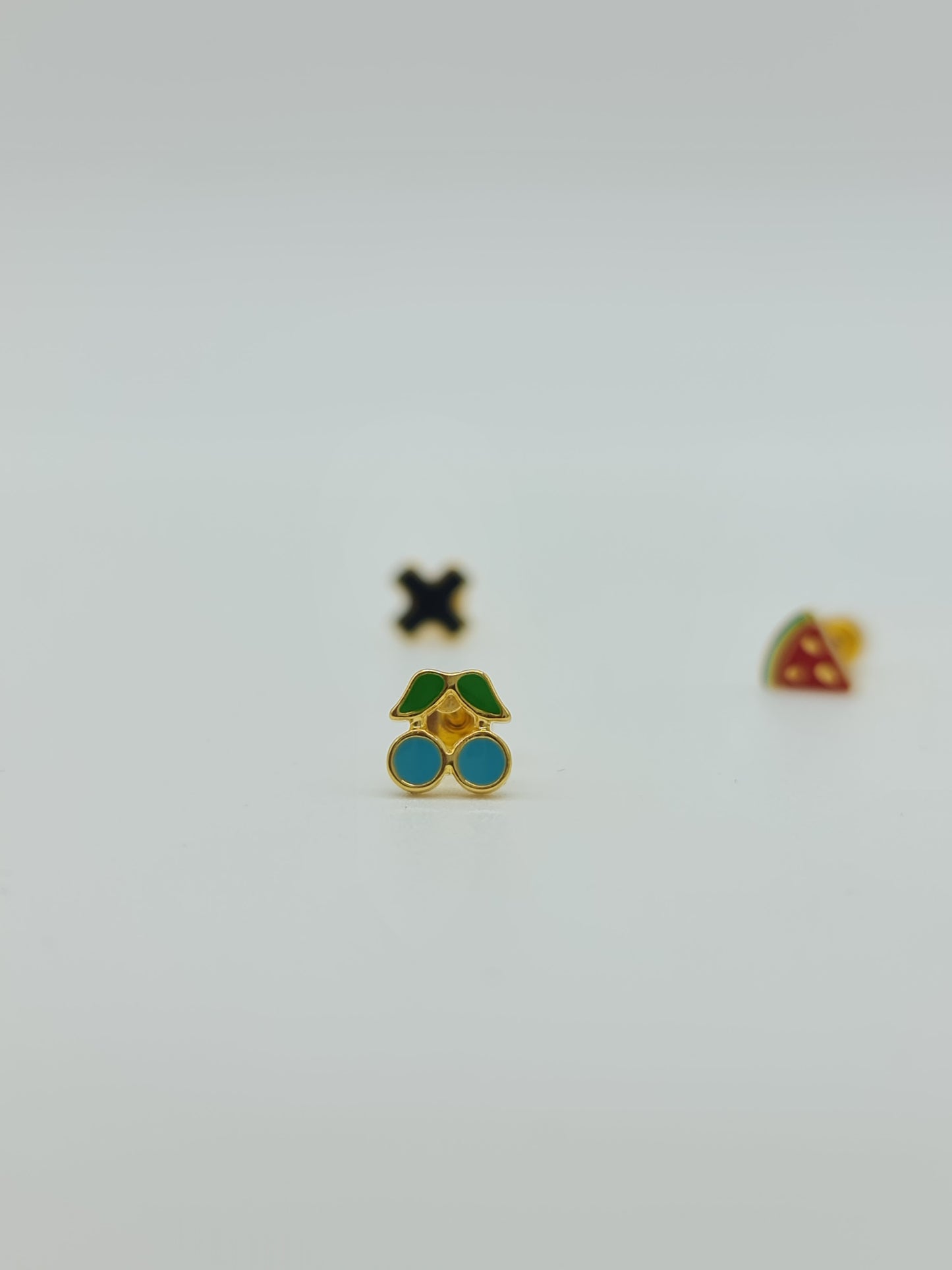 Arete broquel varios diseños