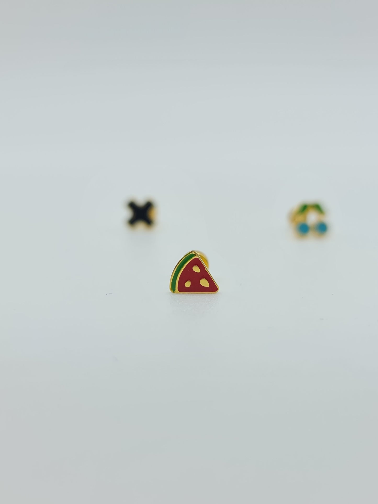 Arete broquel varios diseños