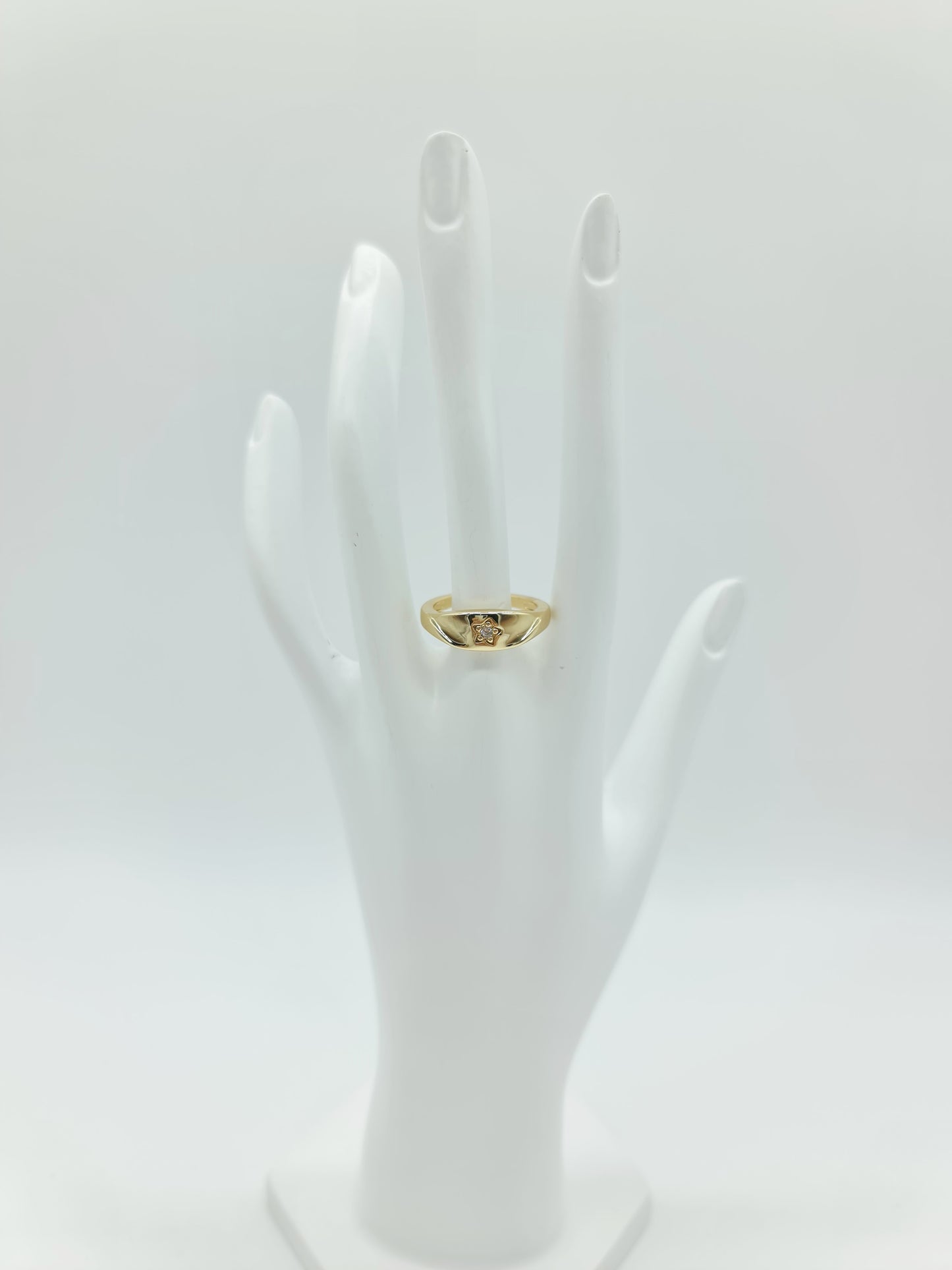 Anillo dorado mini estrella en pedrería