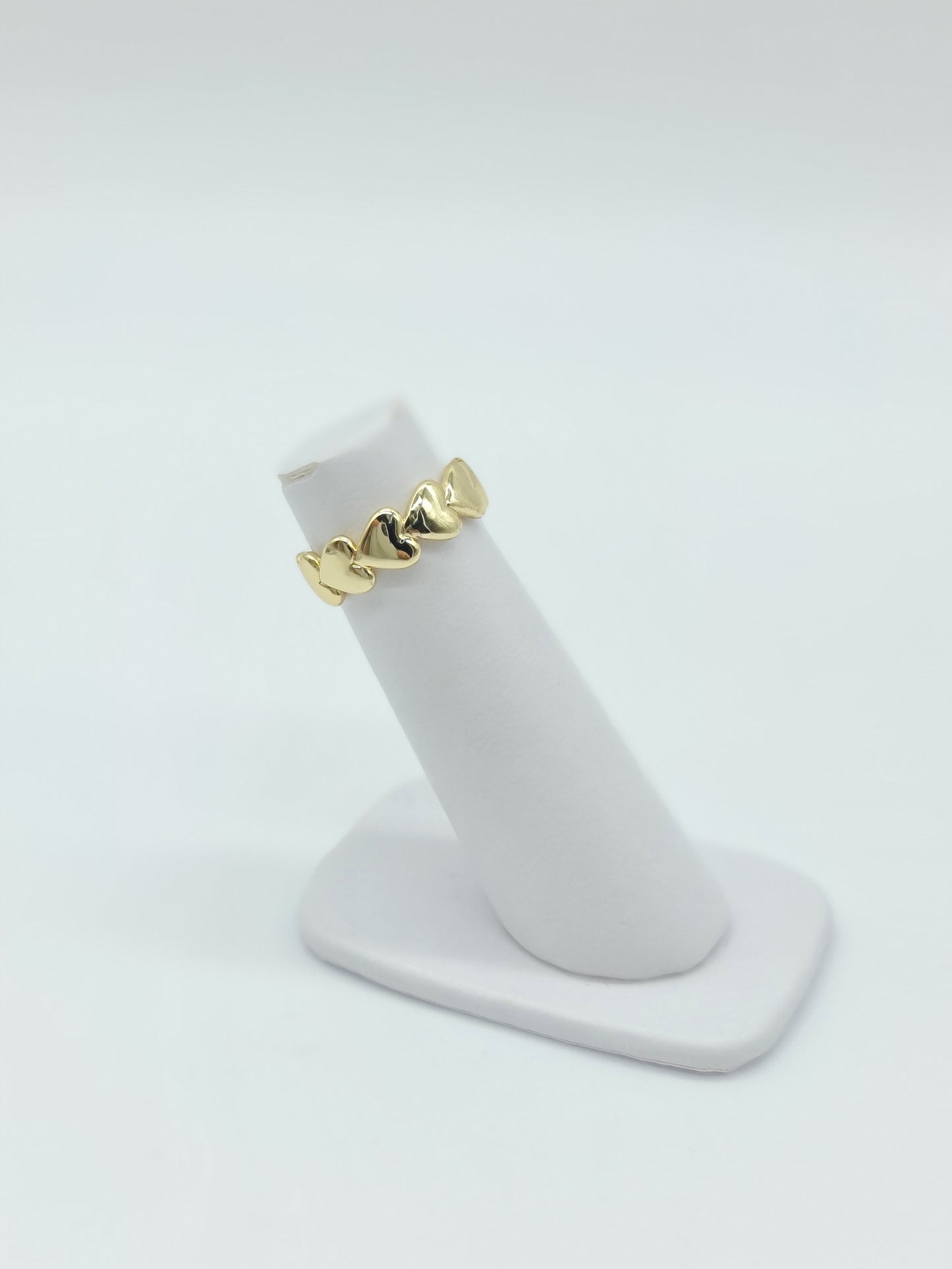 Anillo abrazo de corazón dorado