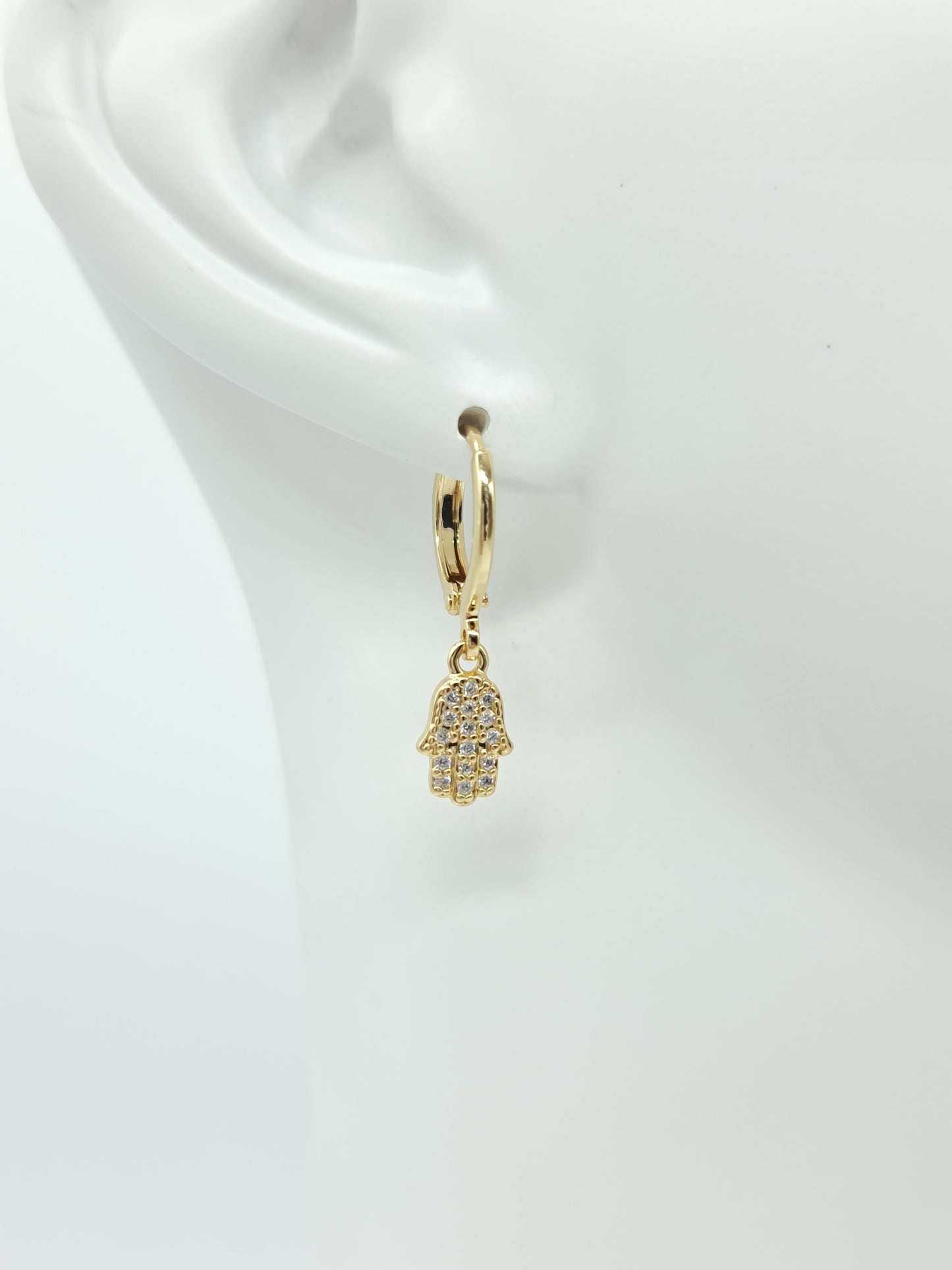 Huggie oro en figuras y cristal