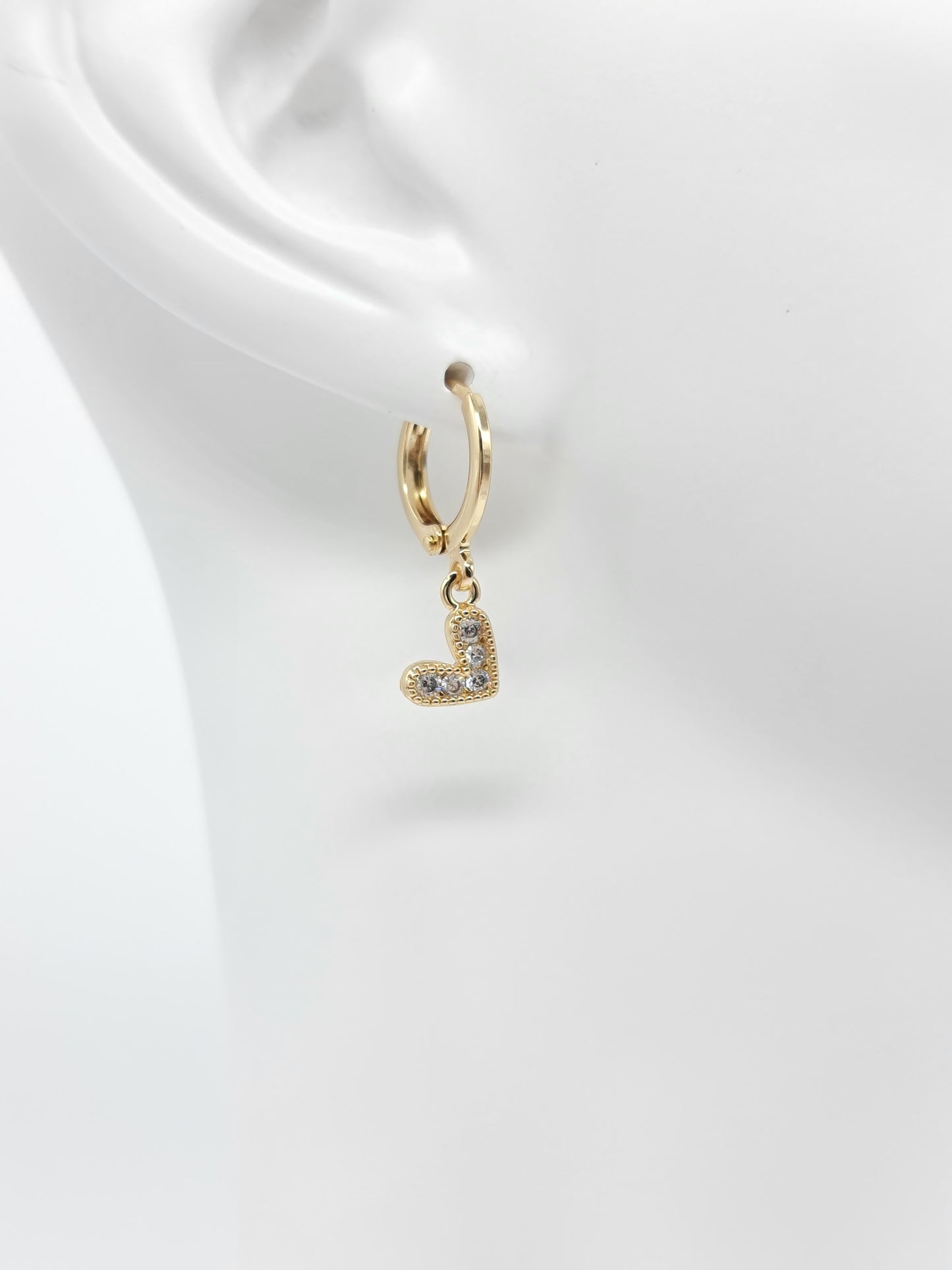 Huggie oro en figuras y cristal