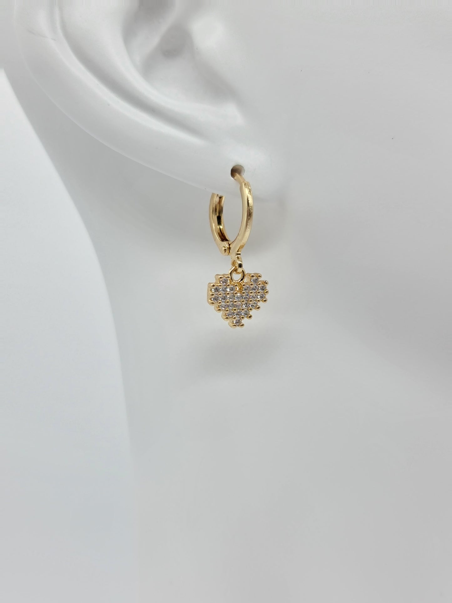 Huggie oro en figuras y cristal