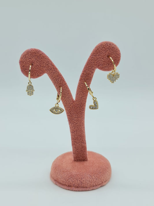 Huggie oro en figuras y cristal